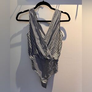 ASOS white and blue striped tank bodysuit
Size 2